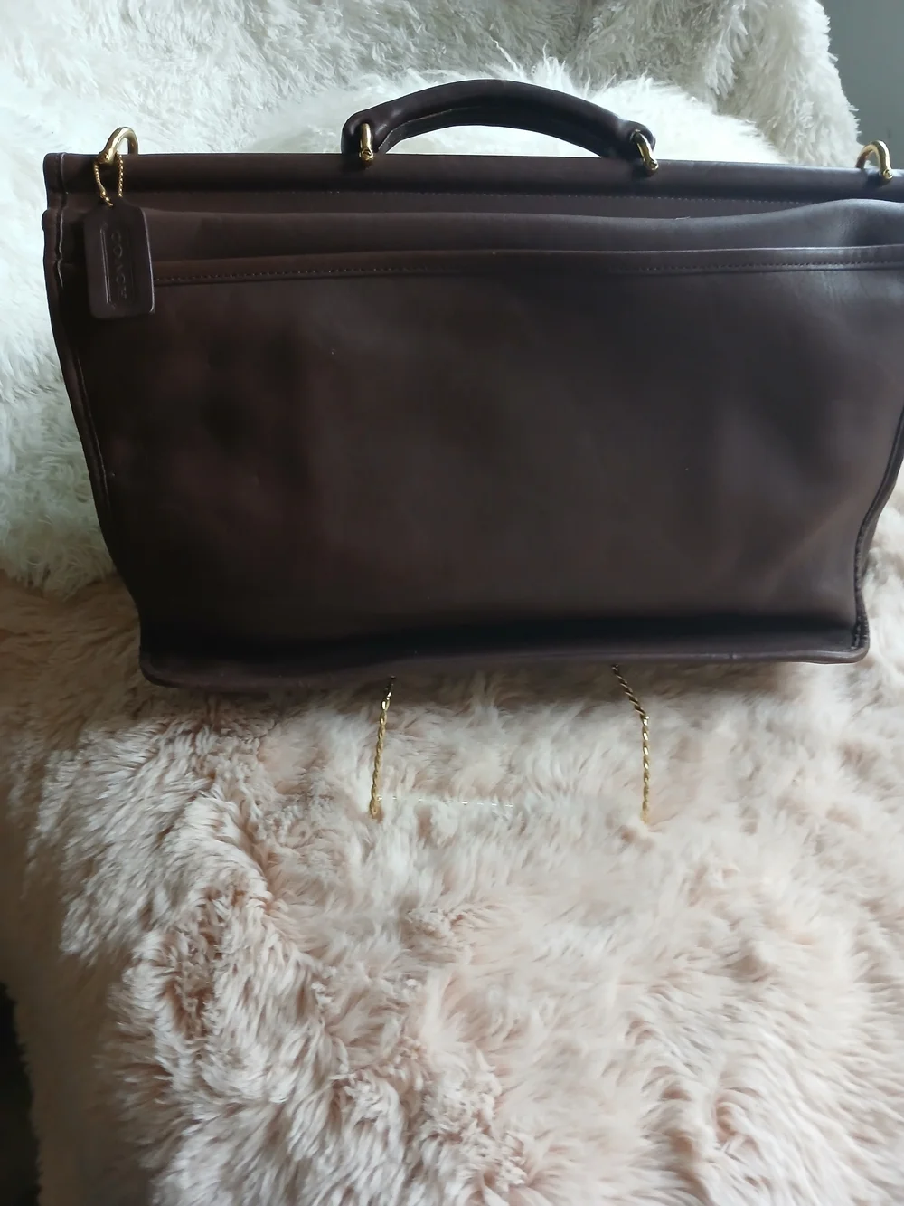 Classic Brown Leather Messenger Bag with Gold Hardware Coach.